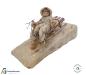 Preview: Spun cotton girl on sled, ca. 1900