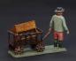 Preview: Grulich nativity figure  " Man with handcart and cradle "  (7 cm)