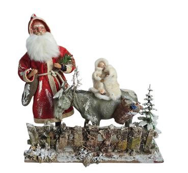 Santa Claus with donkey and Christ child in cotton clothes