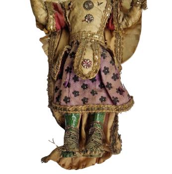 Magnificently dressed nativity figure / angel around 1800