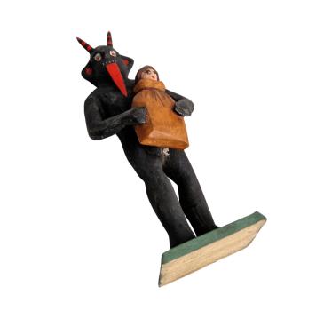 Devil / Krampus holding sack with child (10 cm)