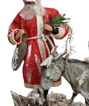 Santa Claus with donkey and Christ child in cotton clothes