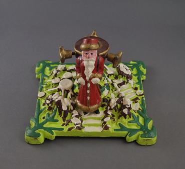 Cast iron Tree stand with Santa
