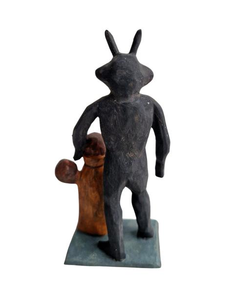 Devil / Krampus holding sack with children (10 cm)