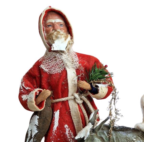 Santa Claus with donkey and Christ child in cotton clothes