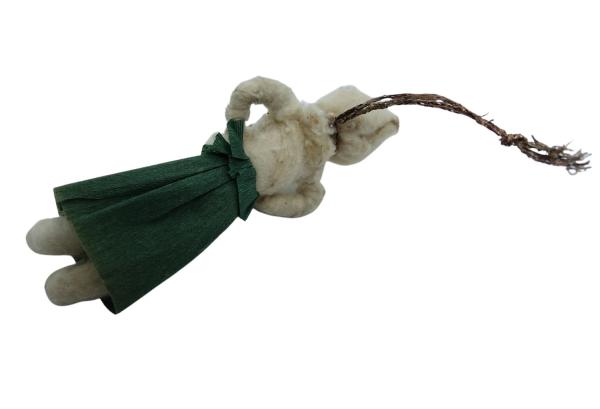 Spun cotton girl with muff, ca. 1900