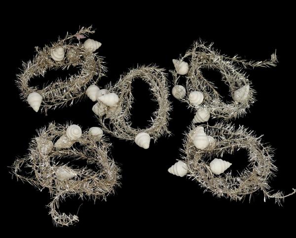 5 silver colored tinsel garlands with spun cotton icicles,  ca. 700 cm - ca. 1930