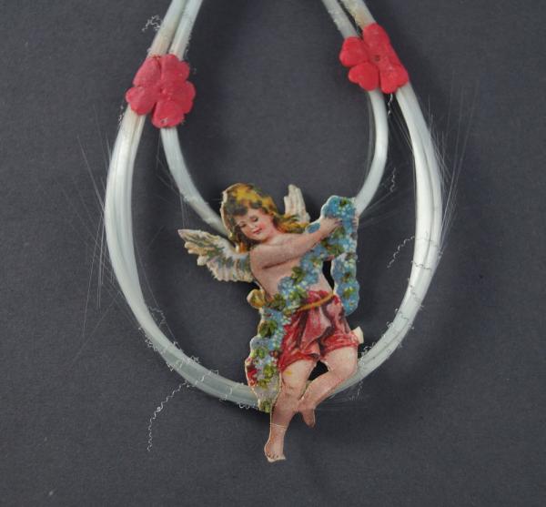 Spun glass ornament with angel scrap, ~ 1920