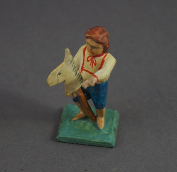 Grulich nativity figure - "Boy with Stick Horse" (7 cm)