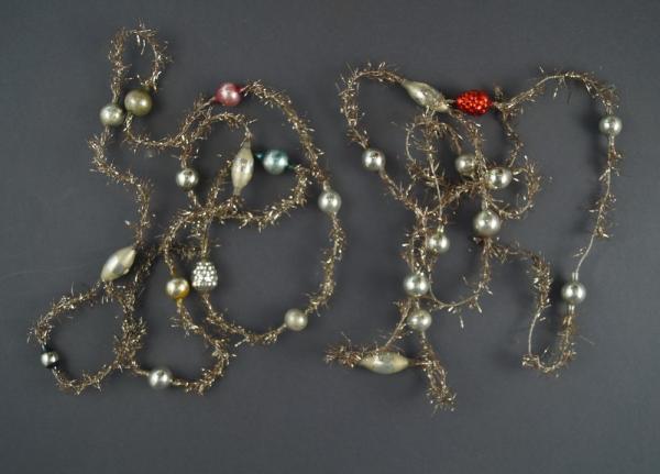 2 gold-colored Tinsel Garlands with glass  Beads,  ca. 290 cm