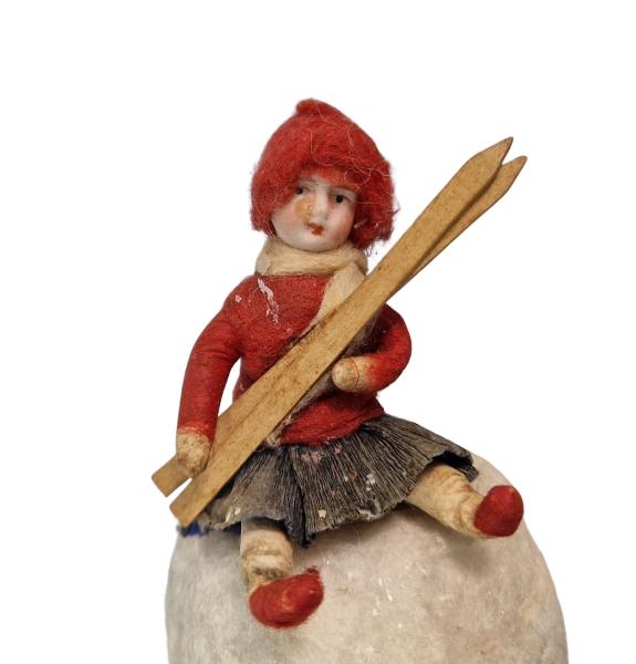 Heubach Spun Cotton Girl with Ski on snow ball, ca. 1900