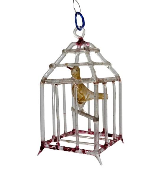 Birdcage with bird, ca. 1920