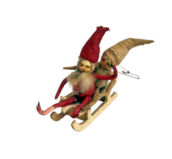 Gnomes on sled, ca. 1920